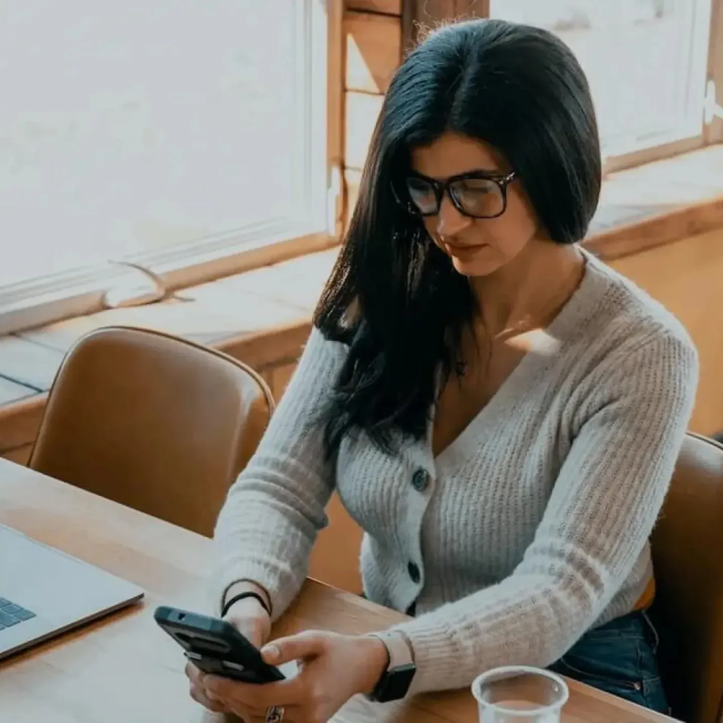 Woman on her phone.