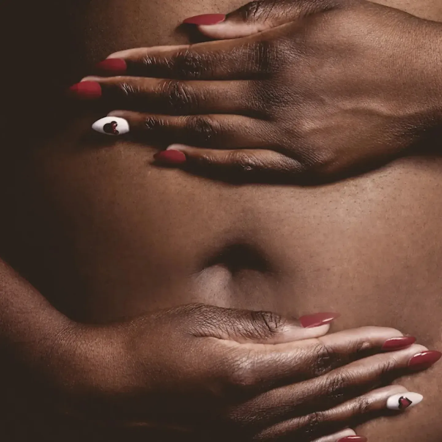 A woman about to do yoga to ease menstrual pain.