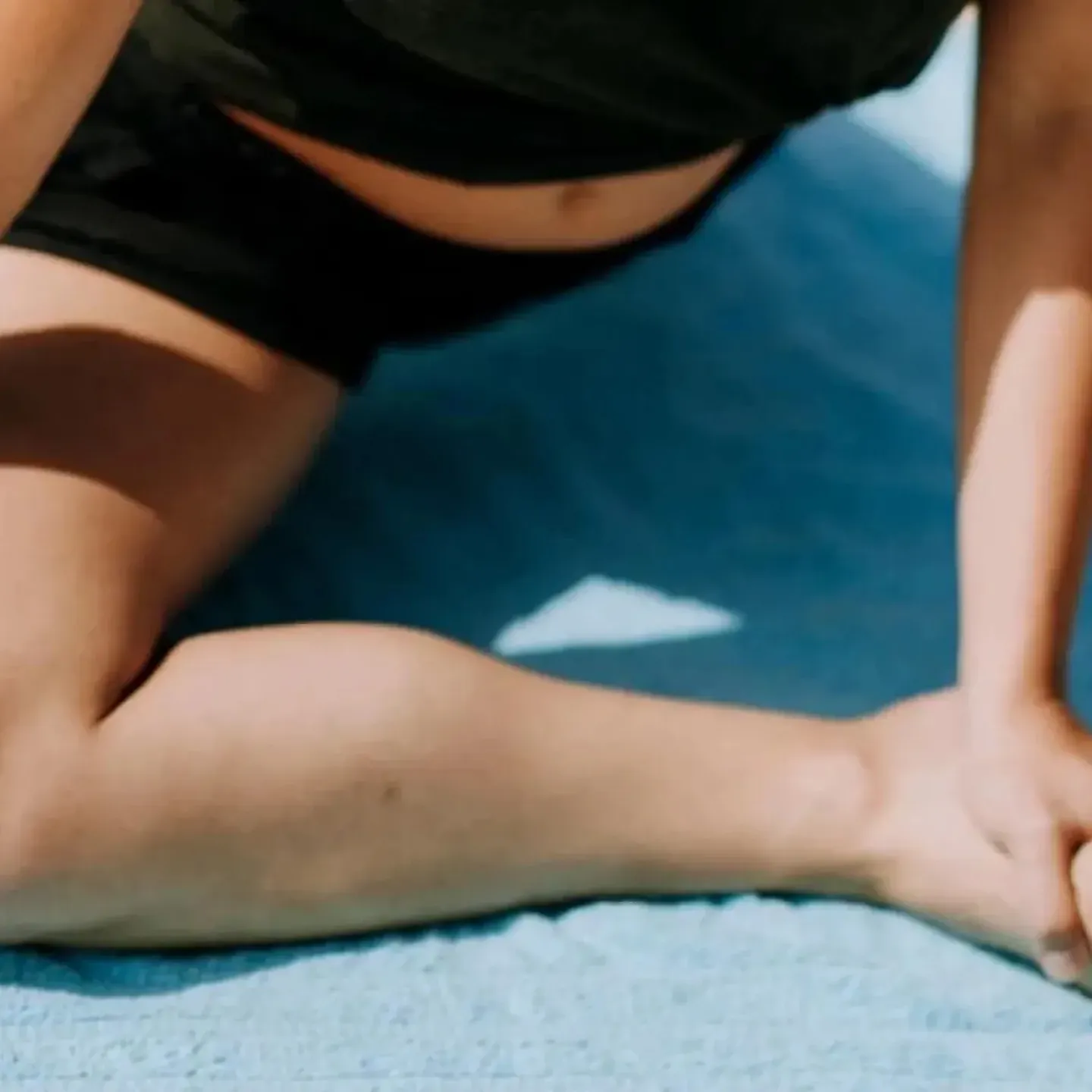 A woman doing pelvic floor exercises postpartum.