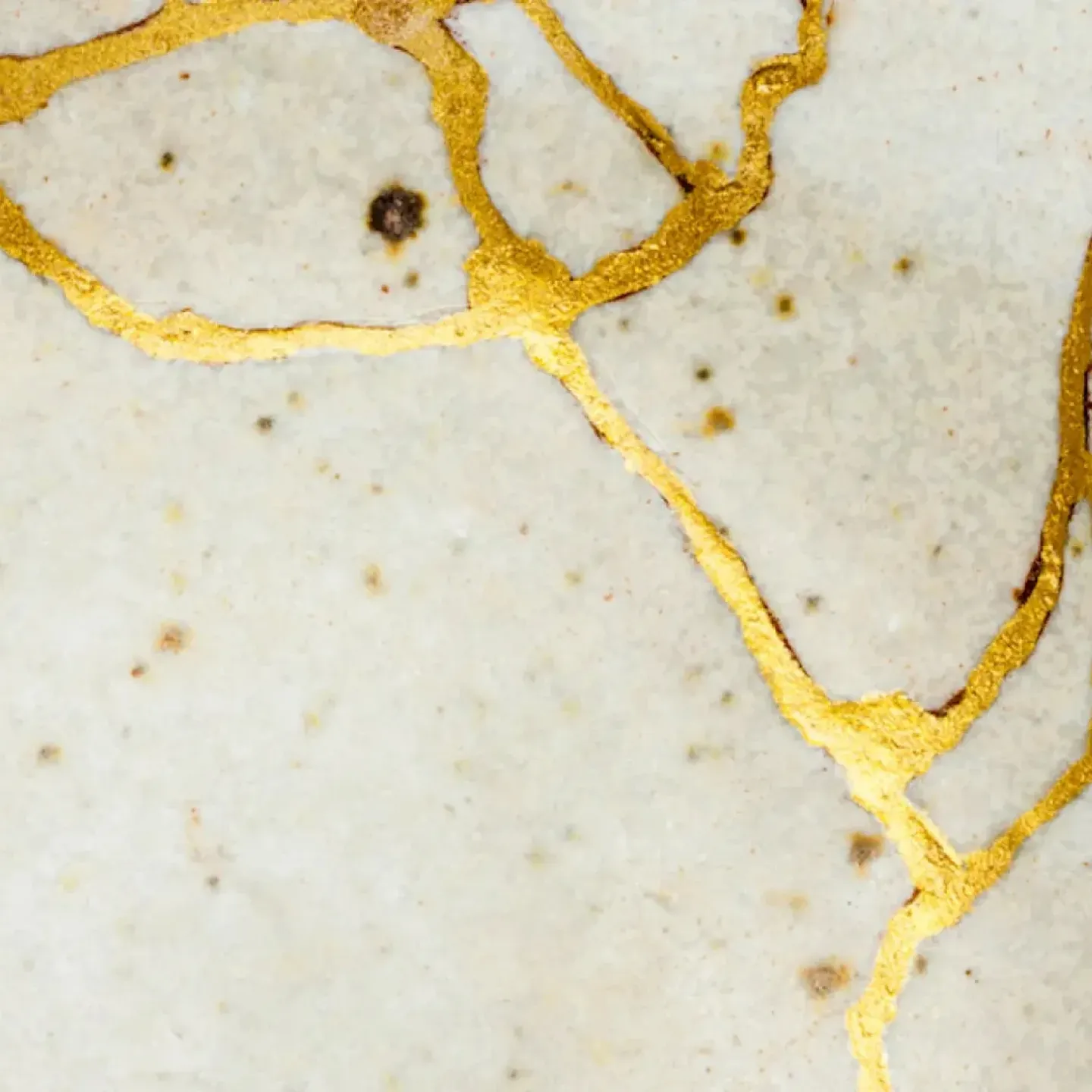 Pottery that has been repaired in the Japanese Kintsugi style to represent an episiotomy scar.