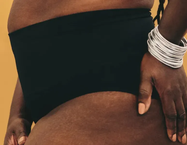A woman with pelvic organ prolapse getting ready to exercise.