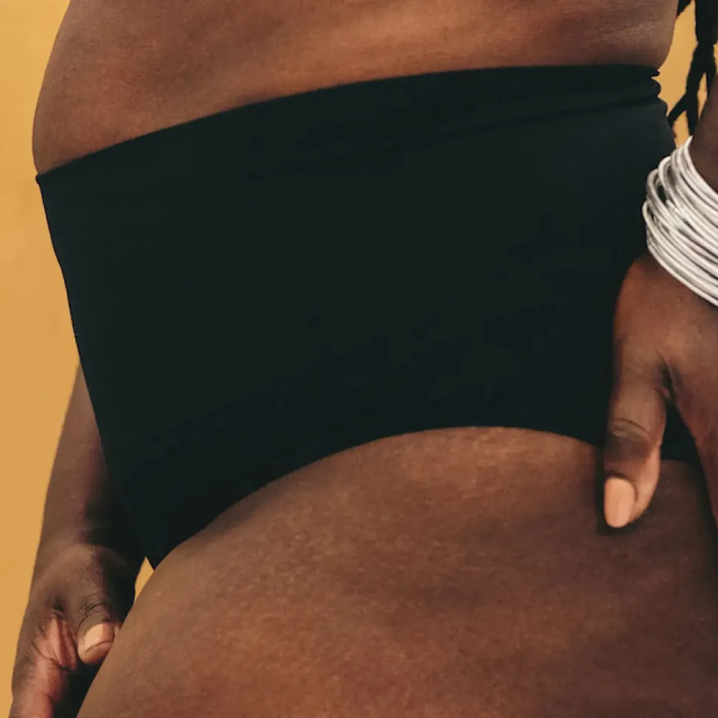 A woman with pelvic organ prolapse getting ready to exercise.