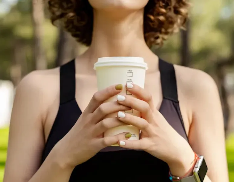 A pelvic floor physical therapist test-driving a posture brace sports bra.