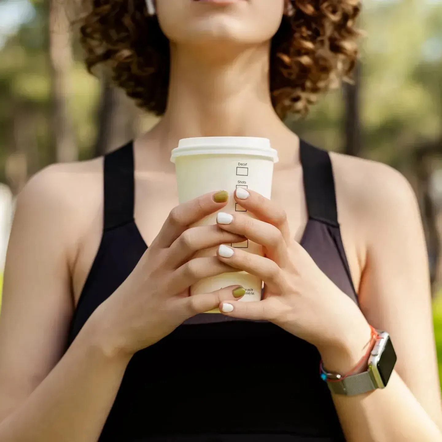 A pelvic floor physical therapist test-driving a posture brace sports bra.