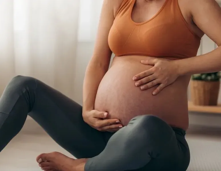 A pregnant woman with a sharp pain in her diaphragm.