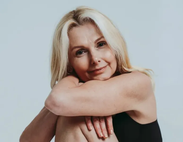 Woman in menopause in treatment for pelvic floor menopause symptoms.