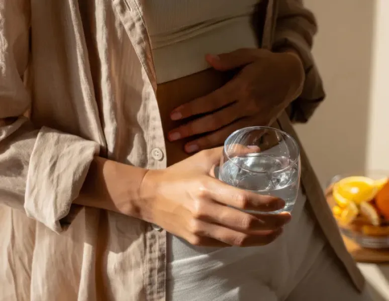 Woman living with uterine fibroids.