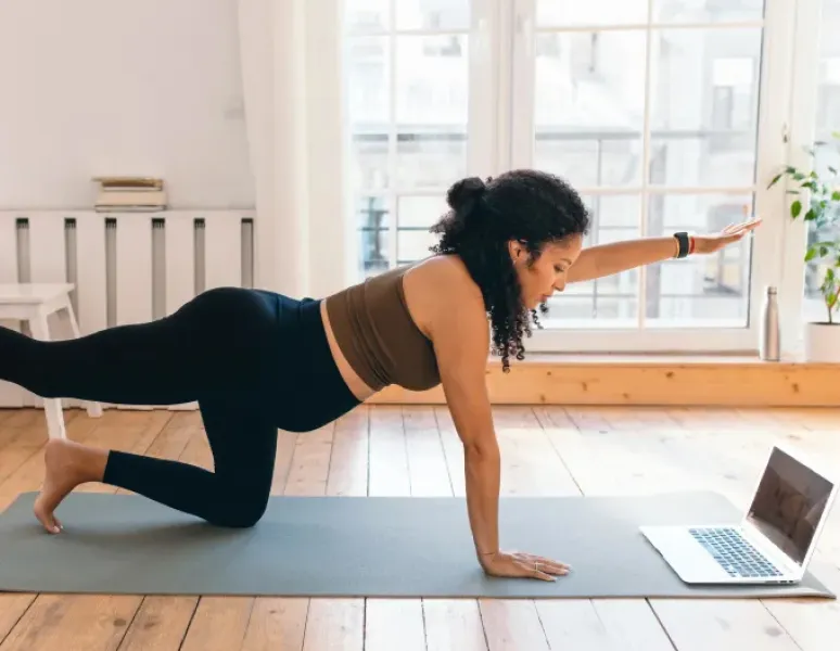 Woman exercising during pregnancy.