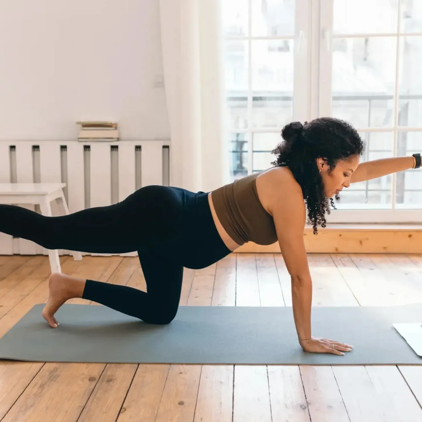 Woman exercising during pregnancy.