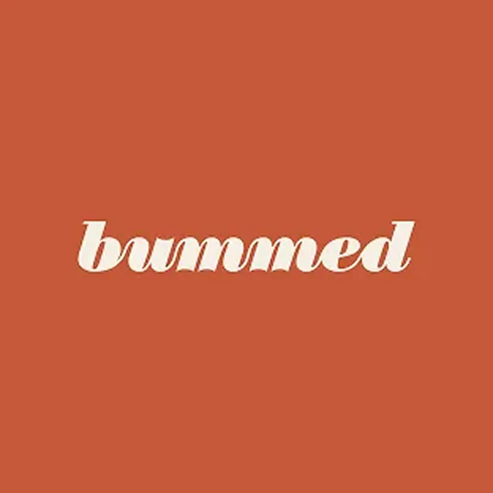 Bummed wordmark logo cinnamon background.