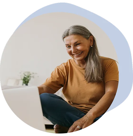 Post-menopausal woman with chronic pain doing virtual pelvic floor therapy.