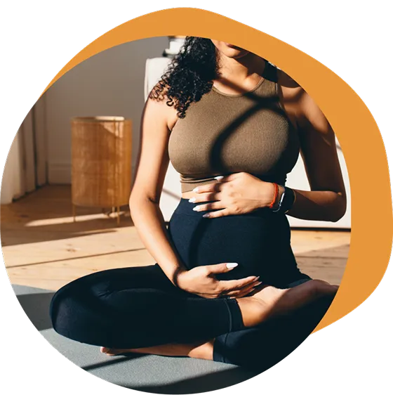 Pregnant woman doing pelvic floor therapy.