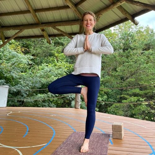 I am a passionate holistic yoga teacher with over ten years of practice and independent exploration of eastern contemplative traditions. Certified as a 200-Hour Registered Yoga Teacher with additional Yin & Somatics training from Kula Collective, I guide students through mindful movement and breath awareness, integrating somatic practices that nurture resilience, presence, and balance. In my classes, students are invited to slow down, connect deeply with their breath, and cultivate a kind and accepting relationship with themselves.

My career in international relations and human rights informs the values and mindfulness I bring to my teaching, which integrates holistic healing focused on energy balance and mind-body connection. This journey has deepened my appreciation for connection, balance, and self-care as essential tools—principles I integrate thoughtfully into every class.