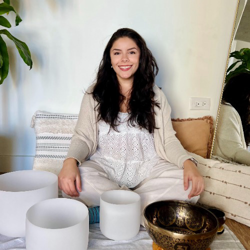Daniela views sound healing as a peaceful dance between ancient resonance and modern release. She blends the powerful vibrations of crystal and Tibetan bowls with ethereal vocal harmonies to connect students with their innate feminine energy. Daniela helps practitioners drop out of the mind and into the heart, using frequency to foster deep relaxation.
With a lifelong musical background, Daniela treats every soundscape as a curated journey for the soul. A Yoga Alliance certified instructor, she has shared her practice at community forums throughout Virginia, bringing a sense of grounded harmony to diverse spaces. Daniela believes that intentional vibration, coupled with the human voice, can bridge the gap between our daily lives and our inner peace.