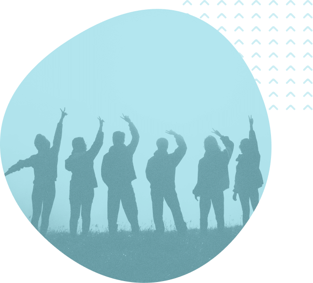 Circular image showing group of people with hands in the air.