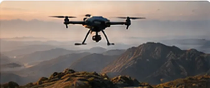 Quadcopter drone in flight above a mountain ridge at sunset