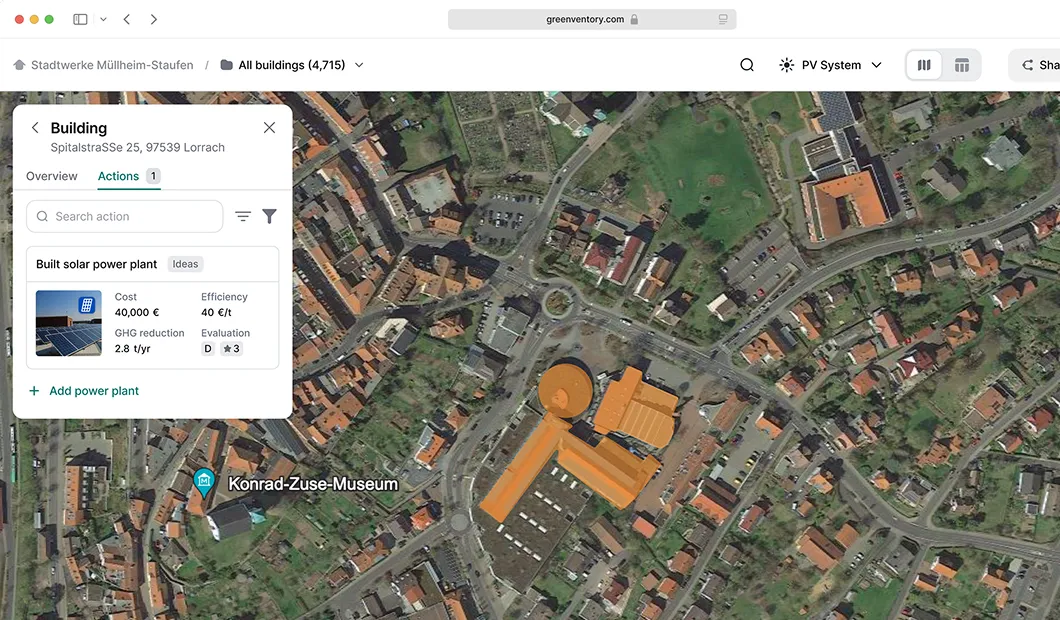 Aerial map view of Spitalstraße 25, 97539 Lörrach, showing a building highlighted in orange with a data panel reporting a built solar power plant costing 40,000 € and reducing 2.8 tons of GHG annually.