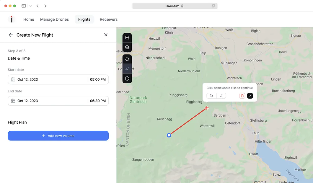 Flight planning interface showing date and time selection for October 12, 2023, and a map with a flight path from a blue start point to a red cross destination near Rüeggisberg, Switzerland.