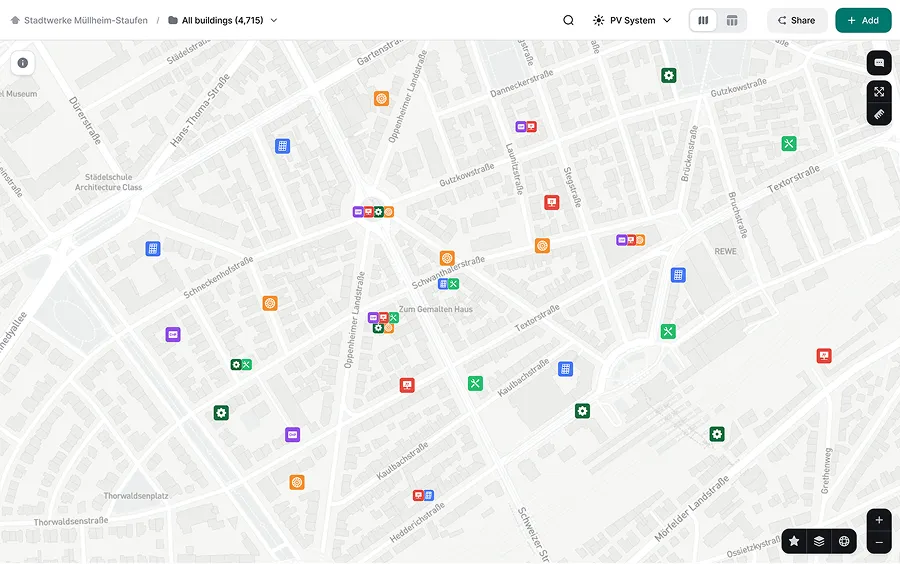 Digital map of Mülheim-Staufen showing streets and various colored icons representing buildings and services.