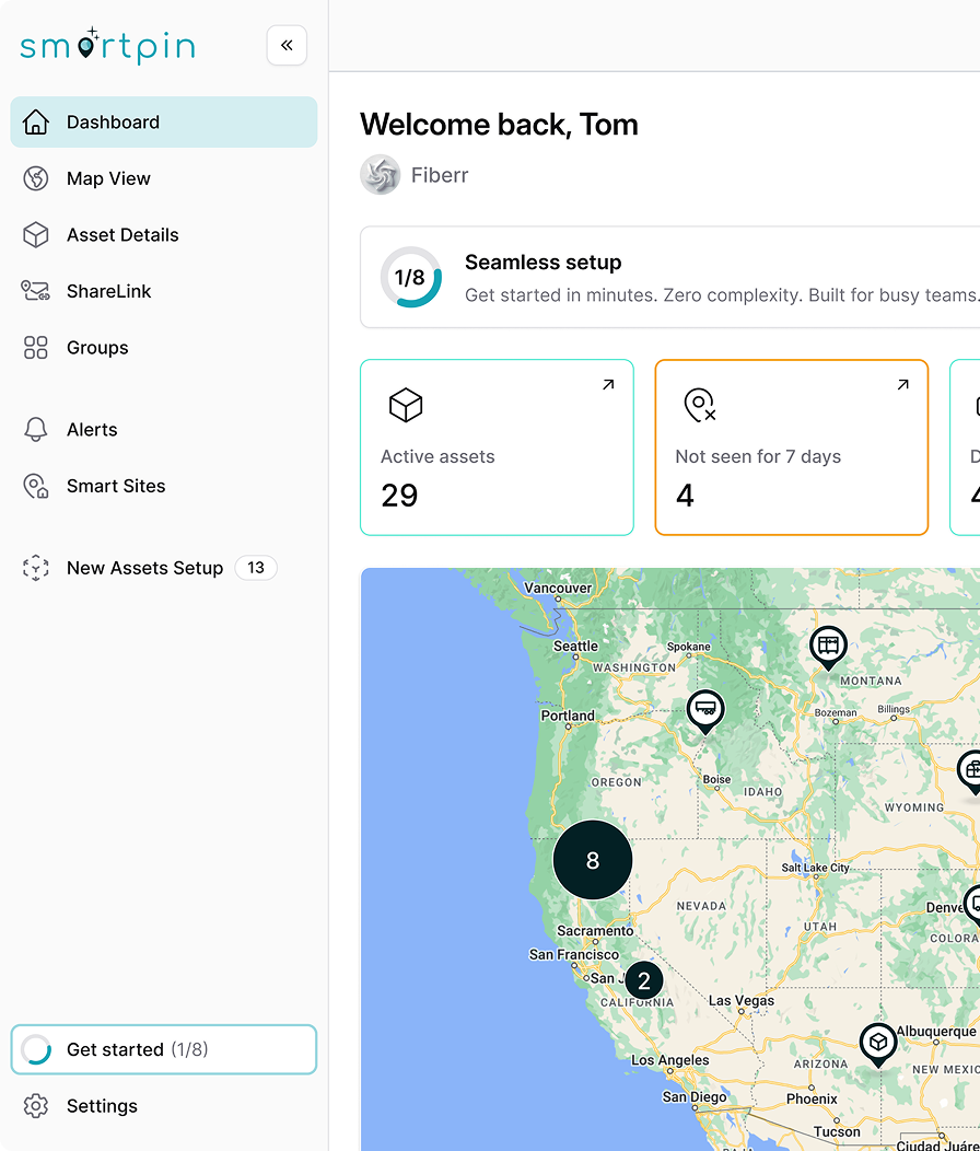 Smartpin dashboard interface showing a map of the western United States with active asset markers clustered near California and across other states, and a sidebar menu with navigation options like Dashboard, Map View, Asset Details, and Alerts.