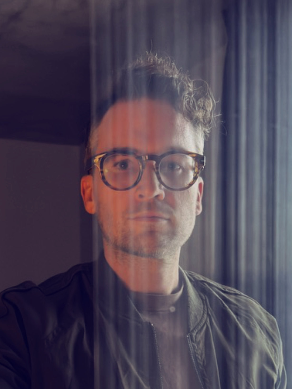 A photo of Shawn with ghostly streaks in front of his face