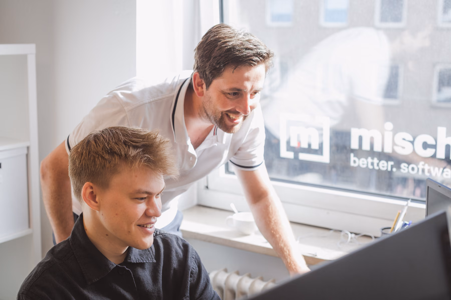 Picture of two happy developer