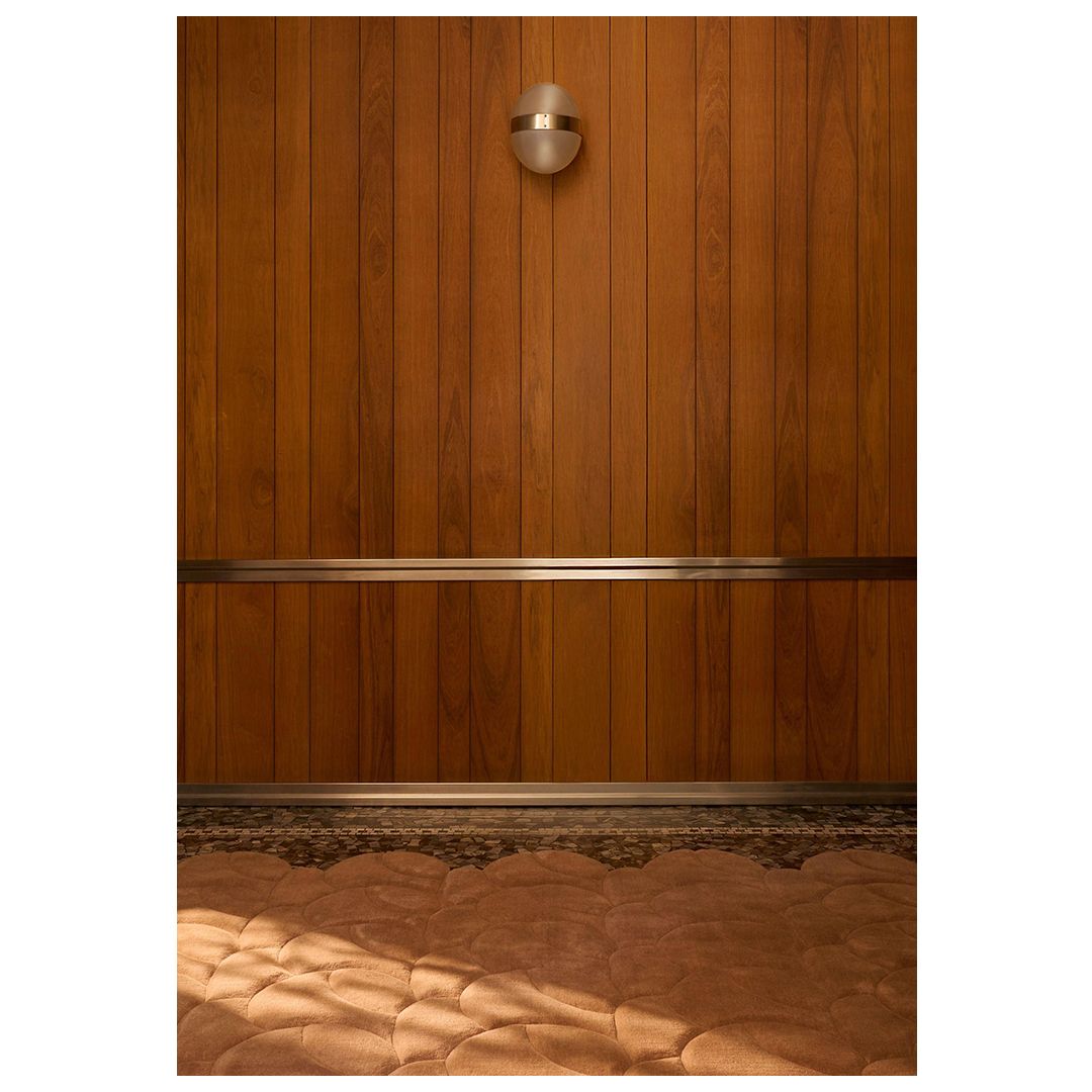 Inspired by organic geometries, the flowing motif frames fie