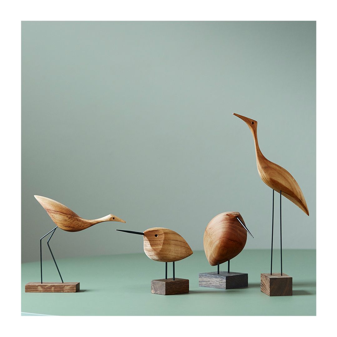 These charming teak birds were created in 1961 by Danish des
