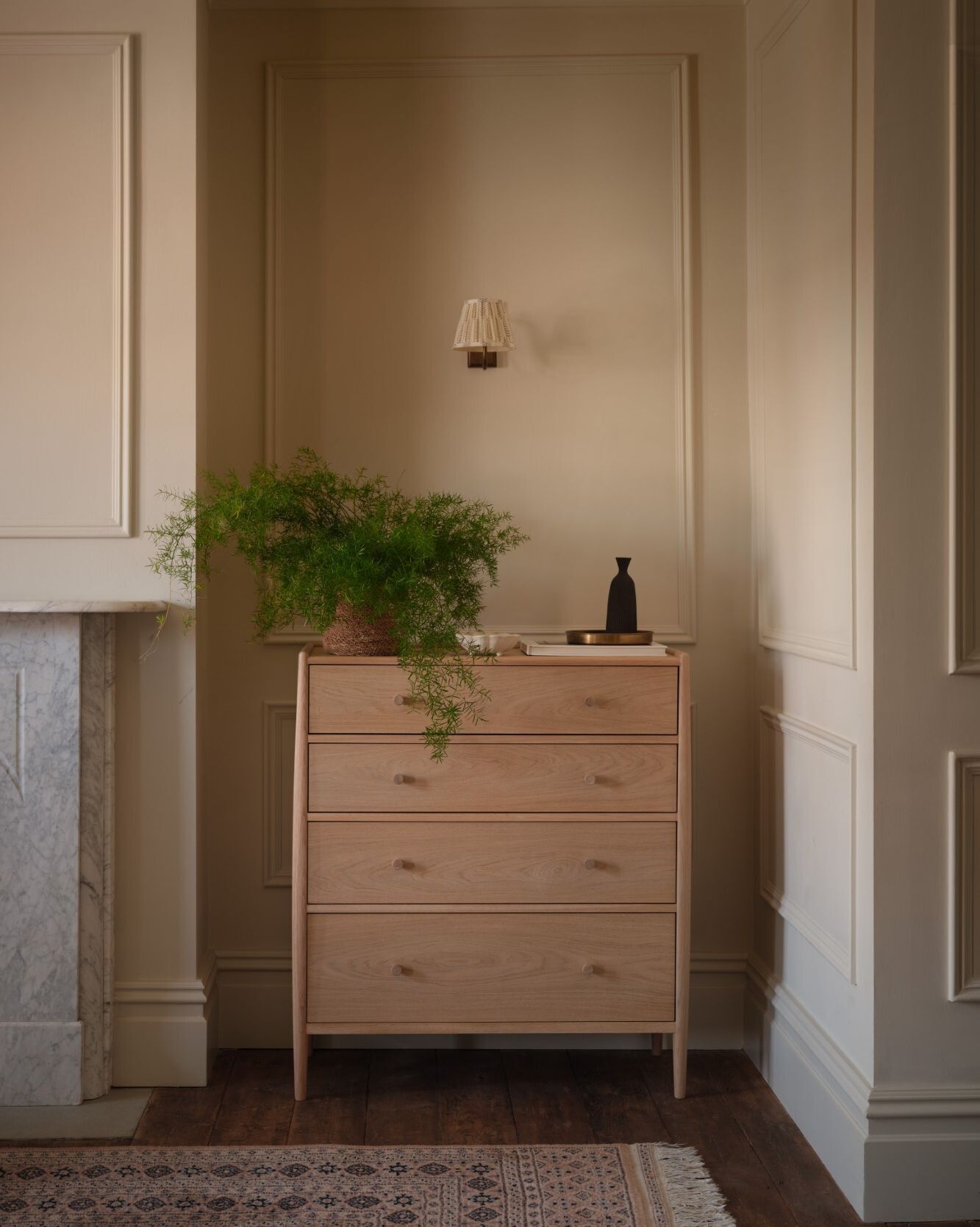 Elevate the everyday with the Winslow 4-Drawer Chest, a cont