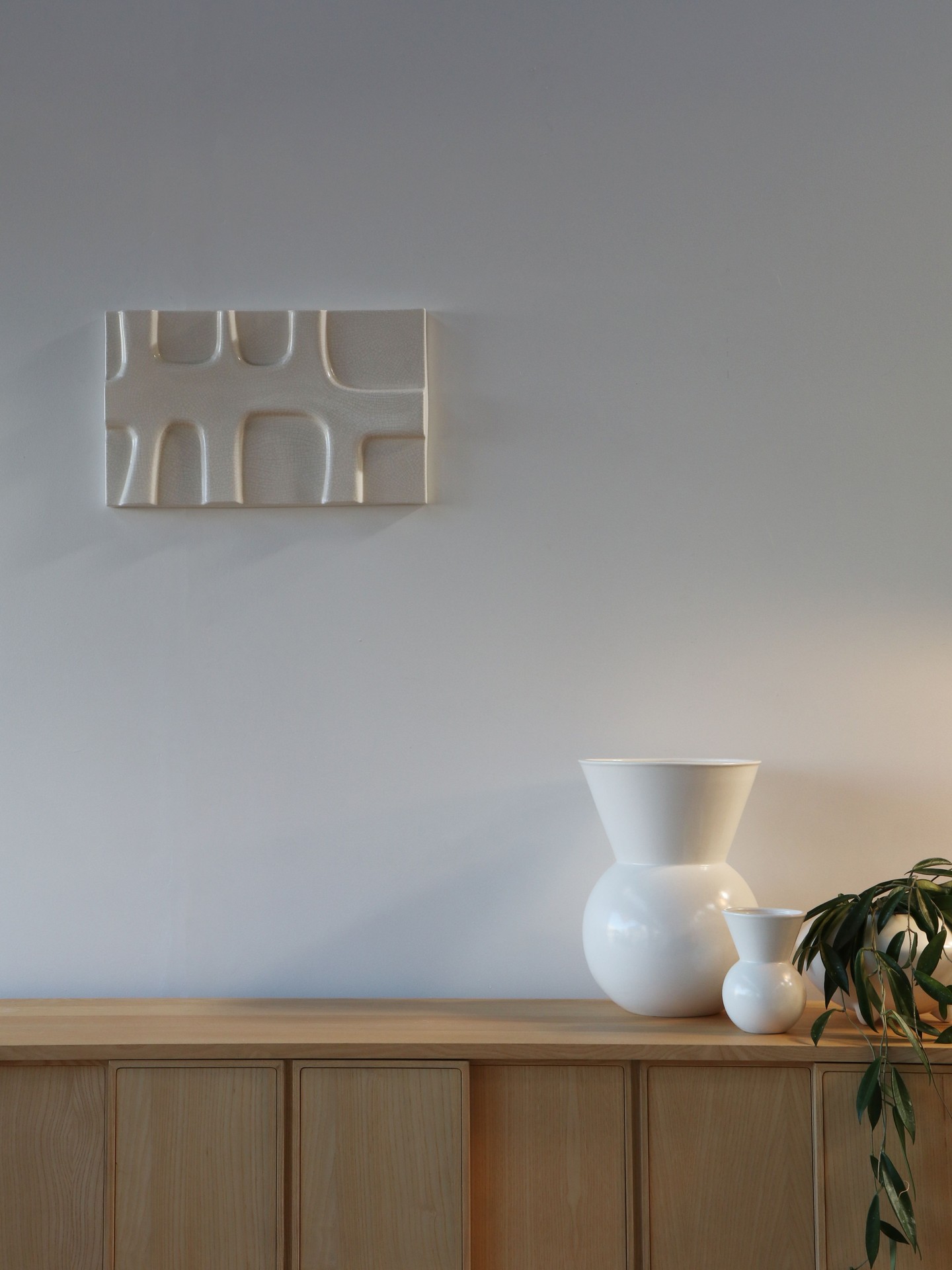 This crackle-glazed ceramic relief by Gidon Bing has a calm 
