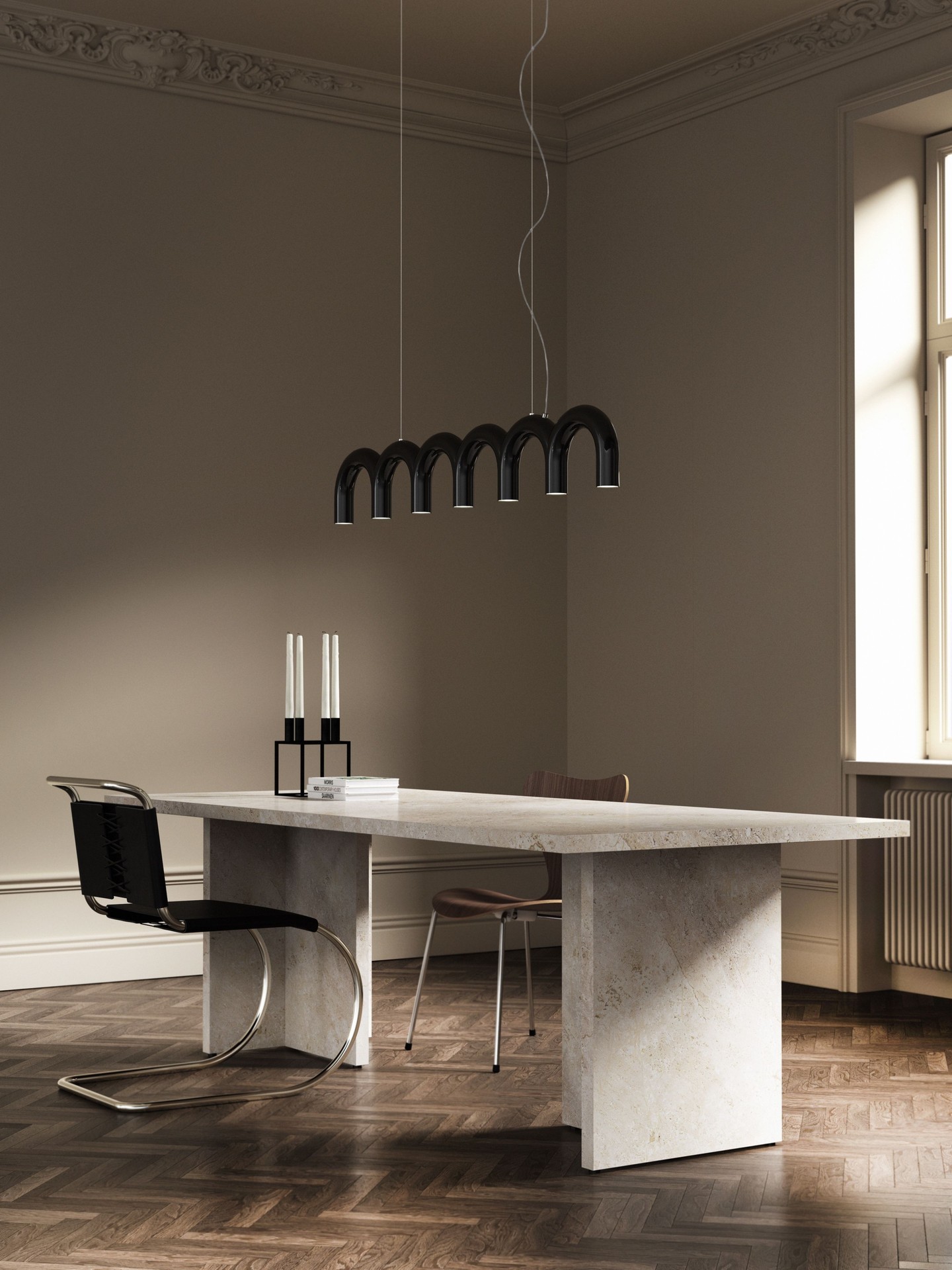 The Arch Pendant design is a successful collaboration betwee