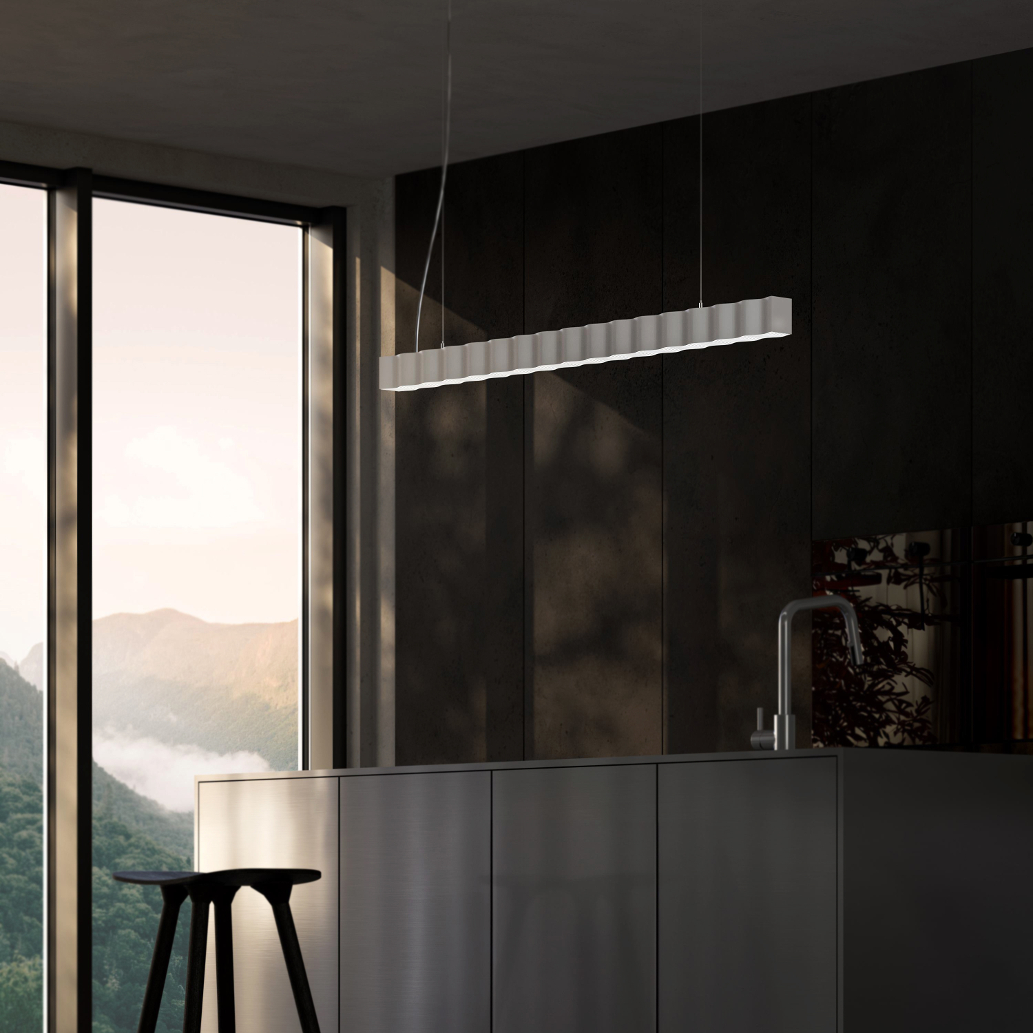 White Superwave pendant in a dark interior beside a tall window.