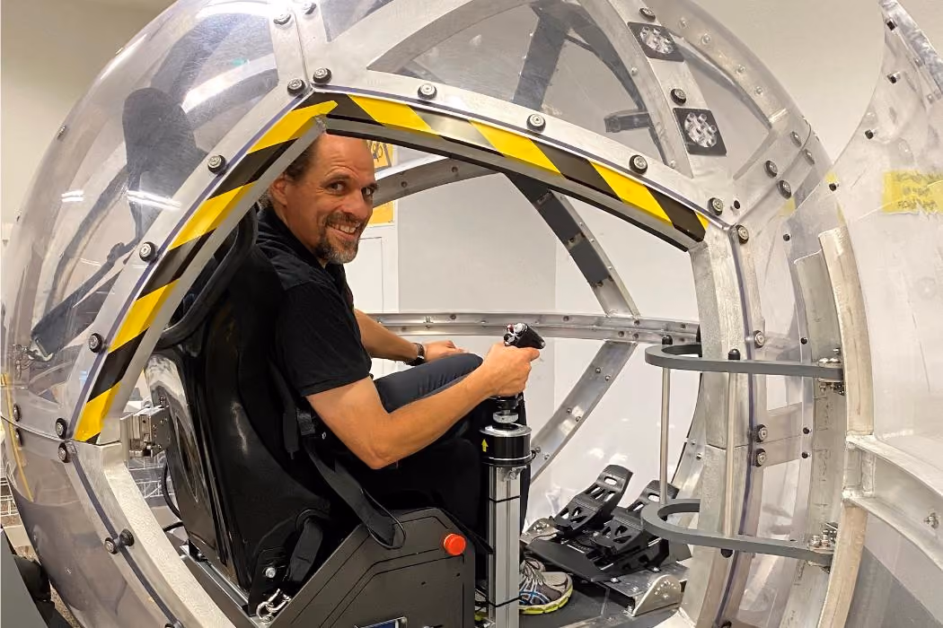 Professor Rob Lindeman from the Canterbury University HIT Lab, inside the NOVA simulator.