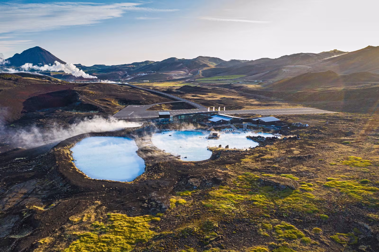 Aerial view of lake, roads and mountains in Iceland