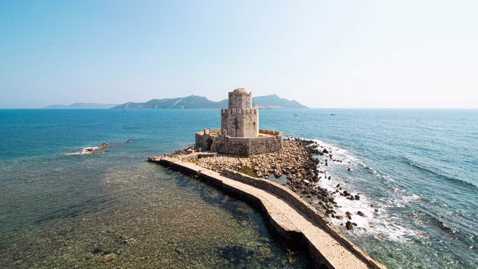 Methoni Castle in Greece with blue sea and clear sky