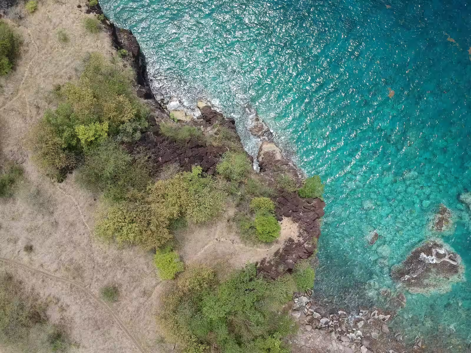 Aerial view of cliff and blue ocean