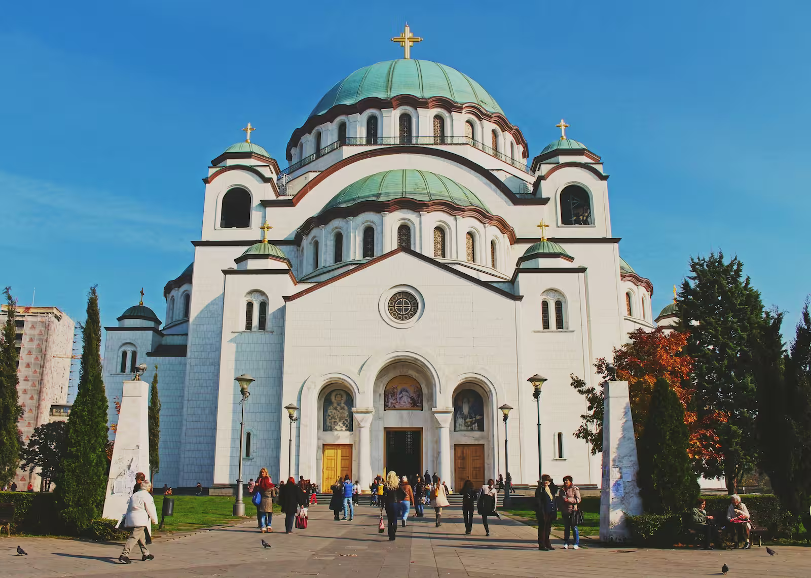 Temple of Saint Sava with people visiting it
