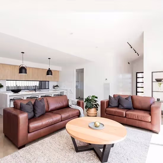 What Colors Go with a Brown Leather Sofa, According to Designers