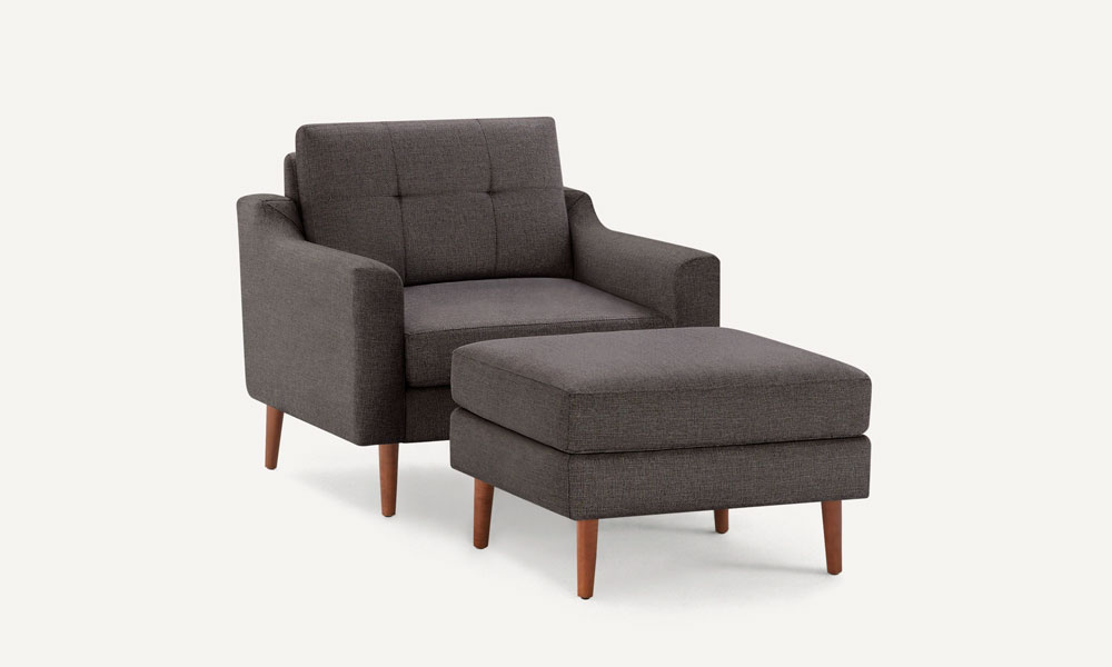 Dark chocolate upholstery Armchair with wooden legs and a matching ottoman