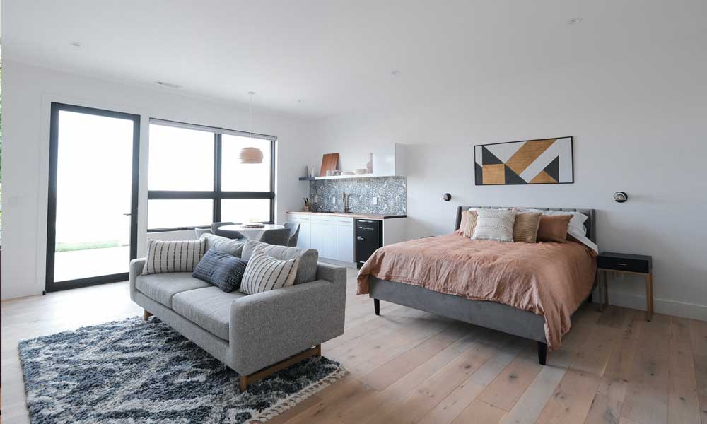 Gray sofa in studio apartment