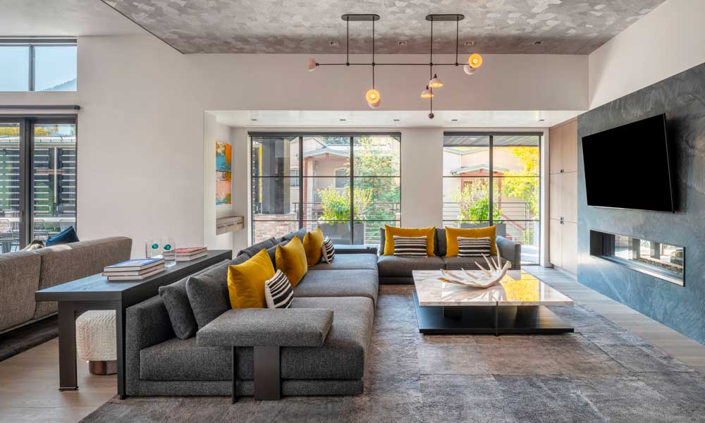 Gray sofa with yellow cushions