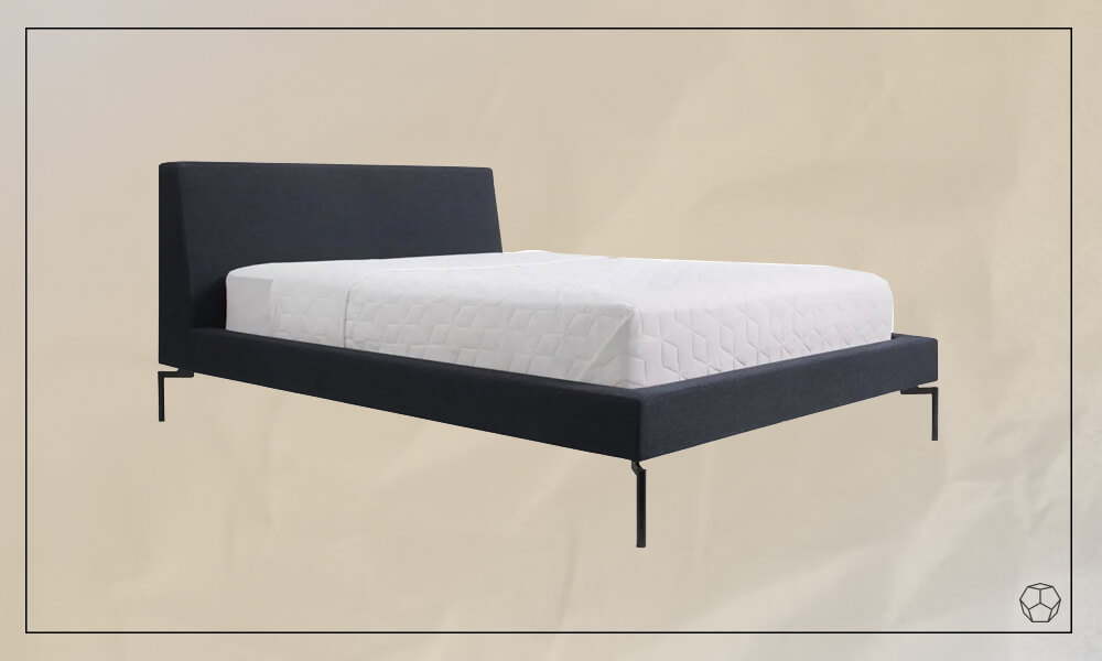Black uphosltered bed with black aluminum legs and a mattress with white sheets