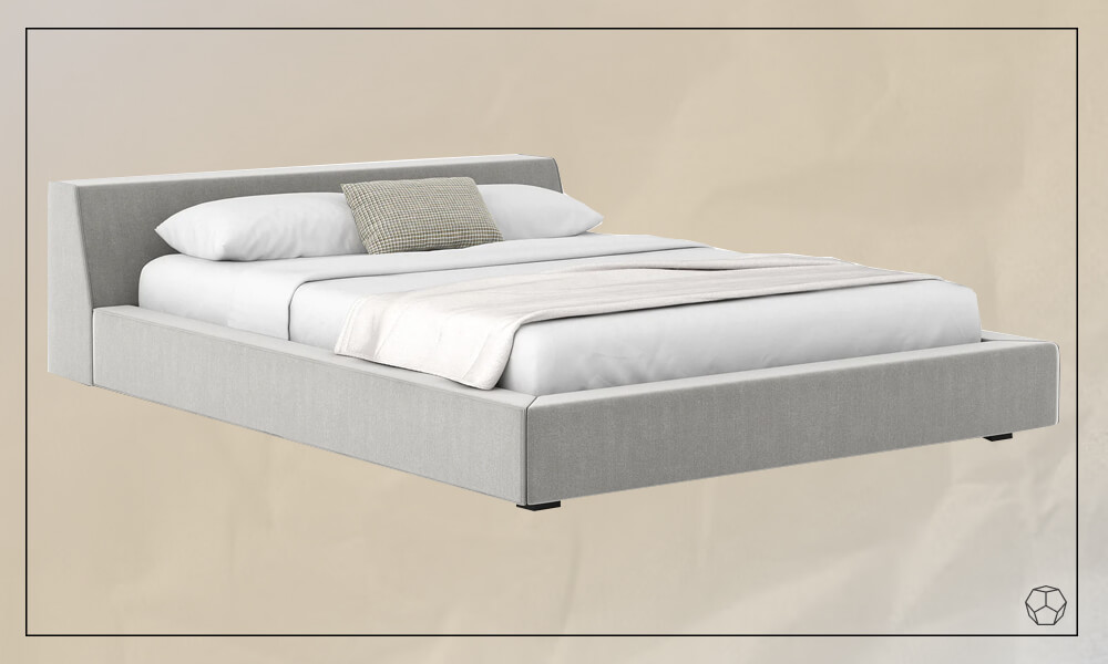 Low upholstered bed frame with light gray fabric, a mattress and white bedding sheets and pillows