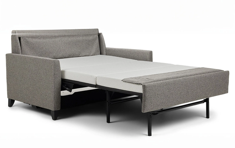 Grey upholstered queen sleeper sofa with a white mattress