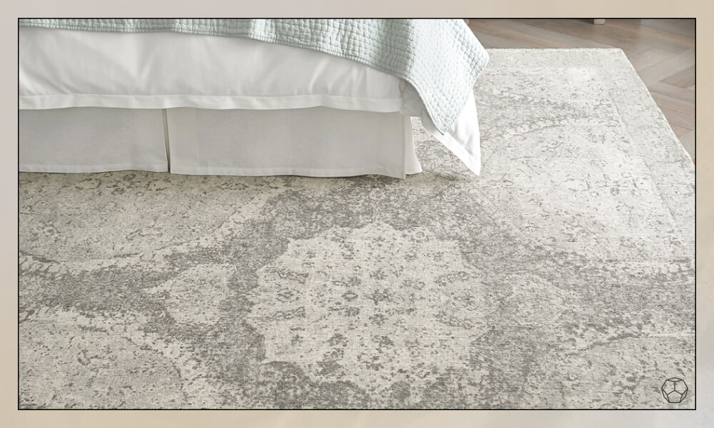 textured light gray wool rug in a bedroom