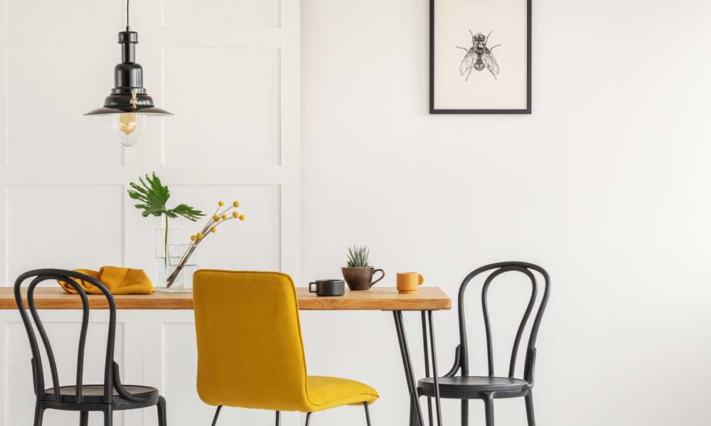 Dining Room with a dining arrangement and a yellow accent Chair