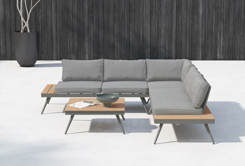 A contemporary outdoor sofa with grey cushions and a matching coffee table