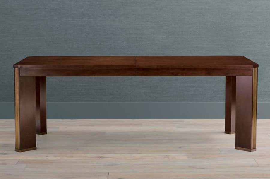Extendable dining table with a wooden top