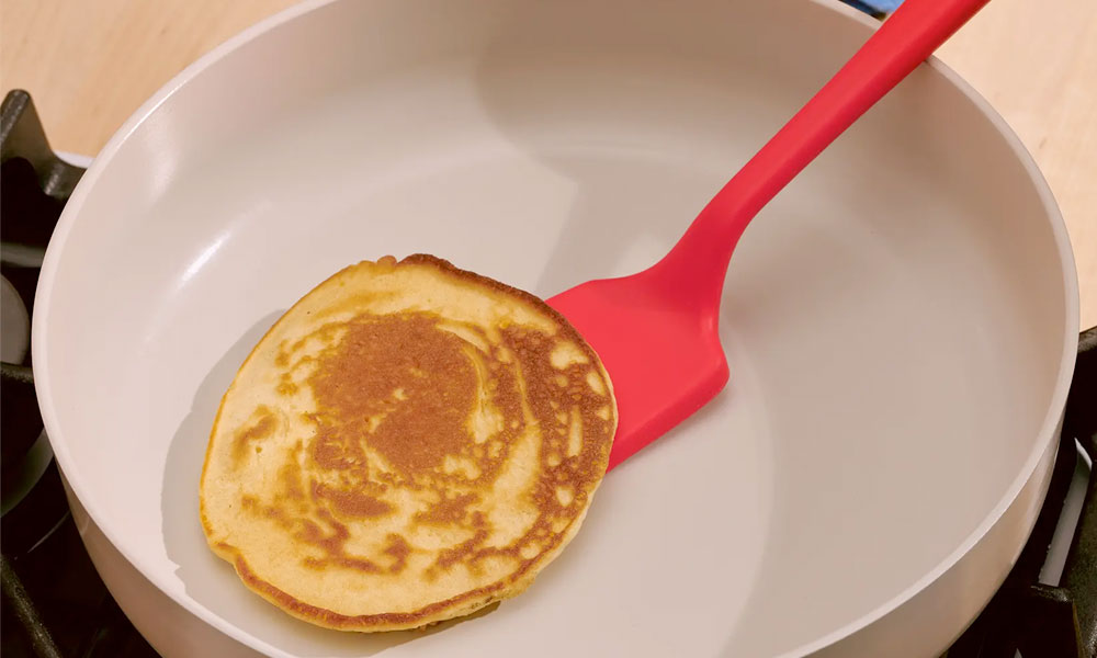 Silicone Spatula removing a pancake from a pan
