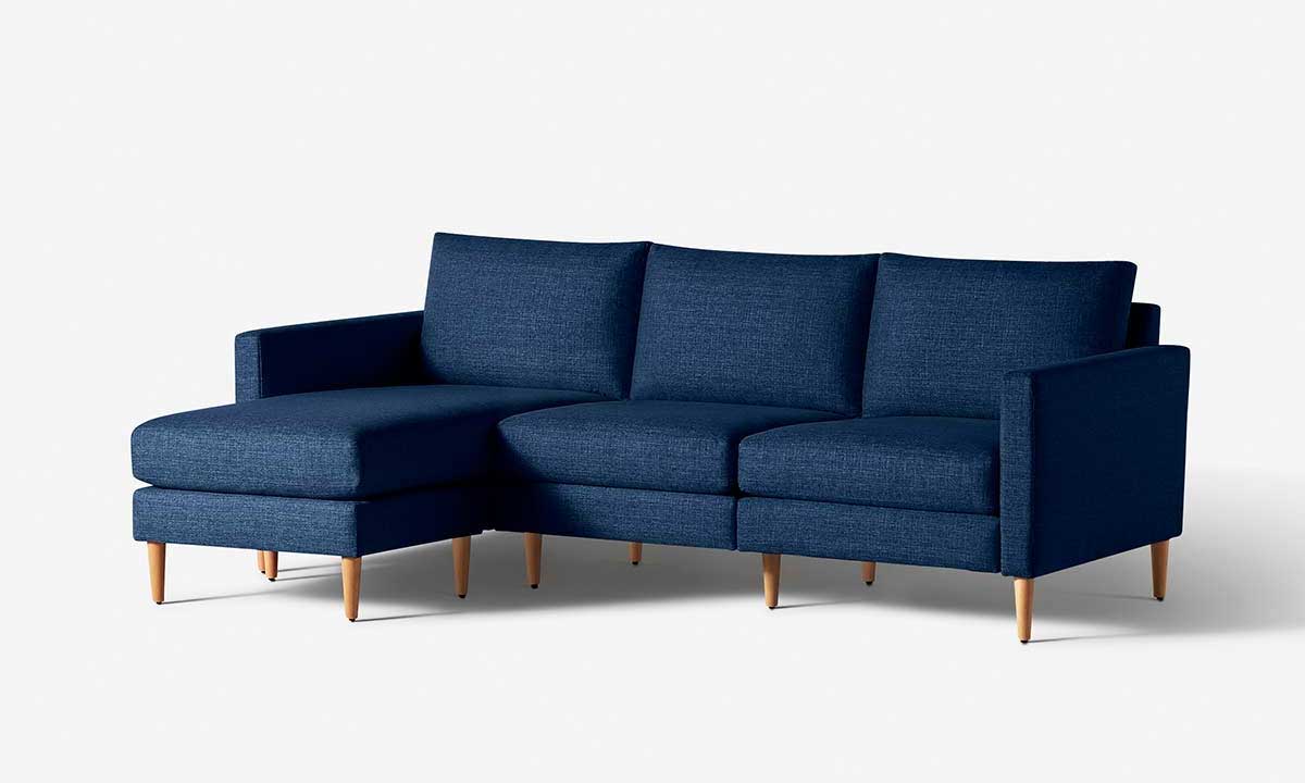Blue sectional sofa with ottoman